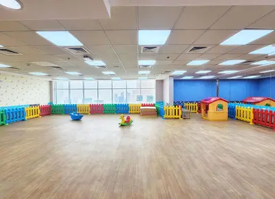 a large room with brightly colored play equipment in it at RH- Contemporary Living, Studio, Near Burj Khalifa in Dubai