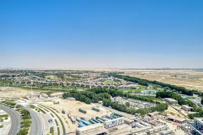 an aerial view of a construction site with a road at Tranquil 2BR with Assistant Room at Mesk 1 Midtown Dubai Production City by Deluxe Holiday Homes in Dubai