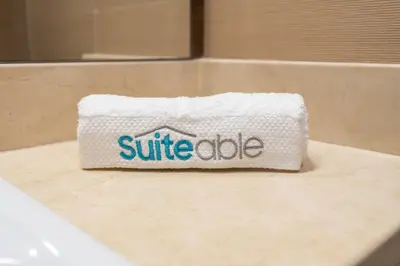 a white napkin sitting on top of a bath tub at Sleek Studio in Dubai's Vibrant JBR Neighborhood in Dubai