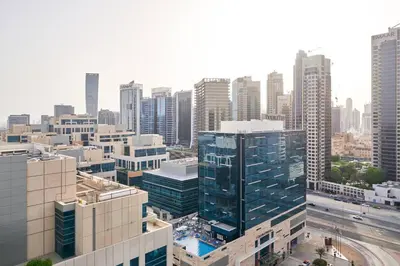 an aerial view of a city with tall buildings at 5* Studio, 10min walk to Dubai Mall, 1min Bay Sqr in Dubai