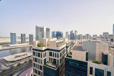 an aerial view of a city with tall buildings at 5* Studio, 10min walk to Dubai Mall, 1min Bay Sqr in Dubai