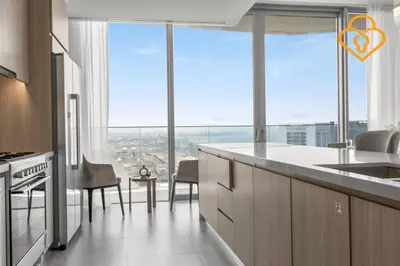 a kitchen with a large window with a view at Keysplease Luxury 3 B/R Fascinating Sea & Dubai Marina Views in Dubai