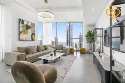 a living room with a couch and a table at Keysplease Luxury 3 B/R Fascinating Sea & Dubai Marina Views in Dubai