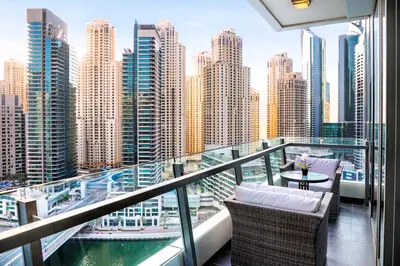 a balcony with a view of a city at Panoramic Luxe 1BR with Breathtaking Views at Dubai Marina Near JBR - Silverene Towers in Dubai