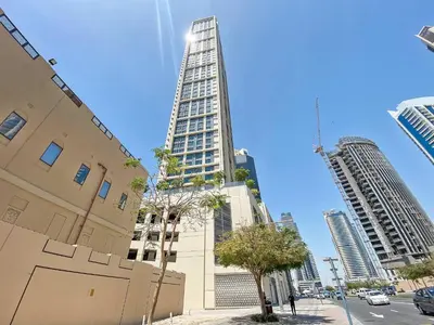 a tall building in a city with tall buildings at Silkhaus elegant 1BDR in Downtown premium tower in Dubai