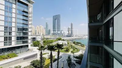 a view of a city from a building at Crystal Clear 1BR in Blue Waters with Ain View in Dubai