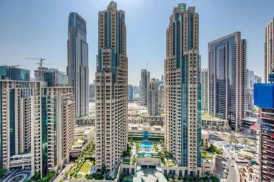 a view of a city with tall buildings at Bellavista - Dazzling High Floor - 2BR - 29 BOULEVARD - Burj Khalifa & Fountain View in Dubai