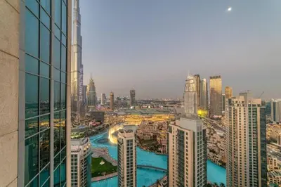 a view of a city with tall buildings at Bellavista - High Floor - 1BR - 29 Boulevard - Burj Khalifa & Fountain View in Dubai