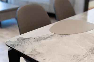 a marble table with two chairs in an office at Upgraded 1Bedroom next to JBR Tourist Destination in Dubai