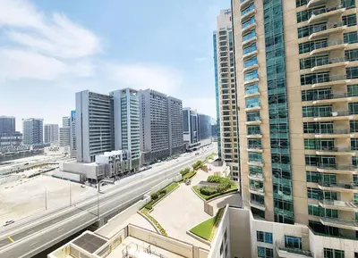 an aerial view of a city with tall buildings at RH- Luxurious Retreat, Spacious 01 BR, near Burj Khalifa and Dubai mall in Dubai