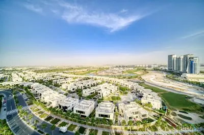 an aerial view of a city with buildings at Delightful Studio at Carson A DAMAC Hills Dubailand by Deluxe Holiday Homes in Dubai