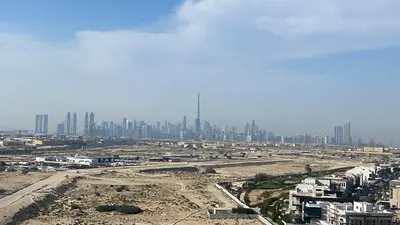 an aerial view of a city with tall buildings at Maison Privee - Graceful Apt in Prestigious Dubai Hills close to the Golf Course in Dubai