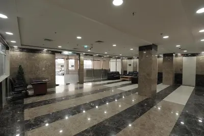 a lobby of a building with a large lobby at Cute Rooms and Small Partitions for Girls in Dubai- Female guests only فتيات فقط in Dubai
