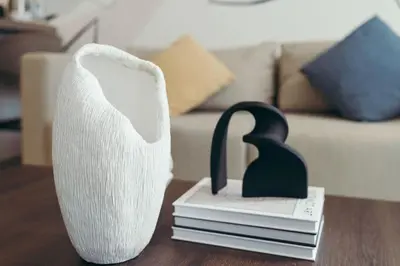 a pair of black and white objects on a table at Maison de Luxe - Jumeirah Living Marina Gate in Dubai