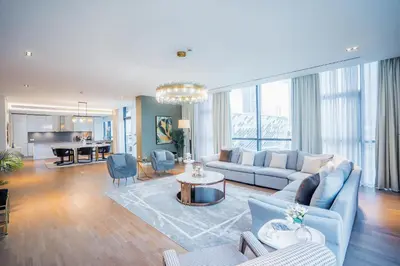 a living room with a couch and a table at Nasma Luxury Stays - City Walk Building 5 in Dubai