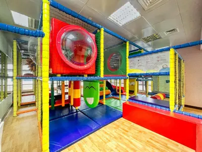 a room with a play room with a play gym at The Smart Concierge - Princess tower in Dubai