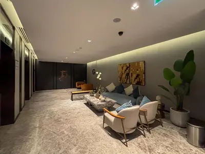 a large living room with a couch and chairs at Frank Porter - 15 Northside Tower 2A in Dubai