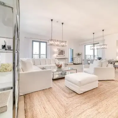 Luxurious 4BR Penthouse with Assistant Room and a Sweeping Balcony Showcasing Burj Khalifa and Sea Views