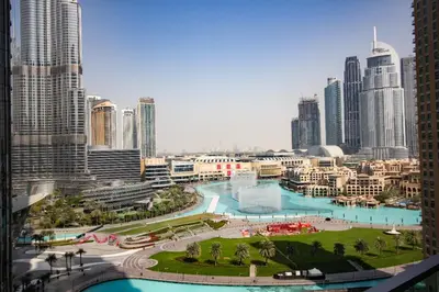 a view of a city with many tall buildings at Luxury 2BR Apartment with Stunning Burj Khalifa & Fountain Views - Opera Grand, Downtown in Dubai