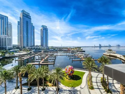 a view of the city of dubai with a marina at Fantastic 2BD apartment in Dubai Creek Harbour in Dubai
