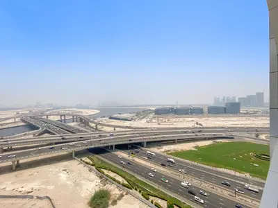 an overhead view of a highway with traffic on it at Spacious 1 bedroom in Business Bay - Close to Downtown in Dubai