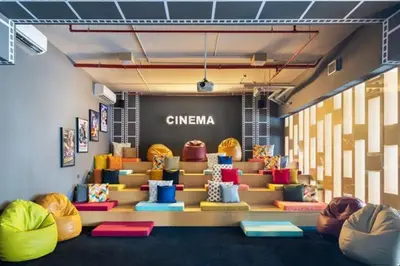 a store with colorful chairs in a room at Nice 1Bedroom - UNA Townsquare in Dubai