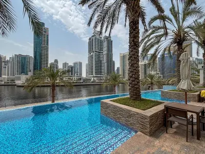 a swimming pool with a view of the city at Frank Porter - Blakely Tower in Dubai