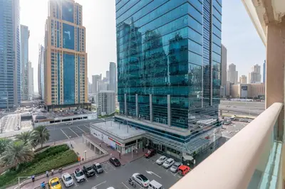 a view of a large glass building in a city at White Sage - Gorgeous Apartment in JLT Near the Metro Station in Dubai