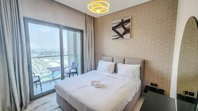 a hotel room with a bed and a large window at STAY BY LATINEM Luxury 1BR Holiday Home CVR A1513 near Burj Khalifa in Dubai
