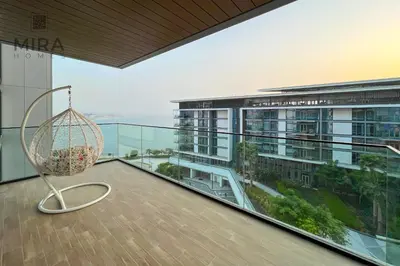 a room with a balcony with a view of a building at Mira Holiday Homes - Fully furnished 1 bedroom in Bluewater in Dubai