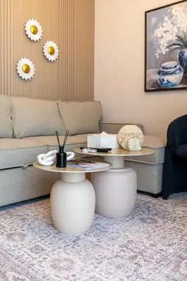 a living room with a couch and a table at STAY BY LATINEM Luxury 1BR Holiday Home CVR A2910 Near Burj Khalifa in Dubai
