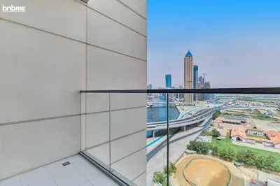 a view from the balcony of a building at bnbme - Luxury 2BR Business Bay Apt w Canal Views Pool Gym Free Parking Downtown in Dubai