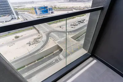 a view of a highway from a window in a building at Stylish studio next to canal in Dubai
