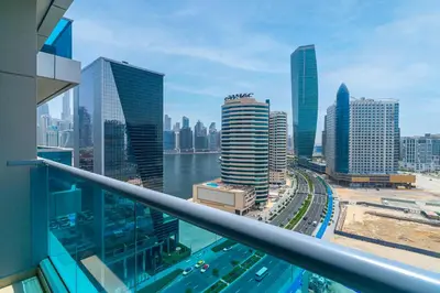 a view of a city from a balcony of a building at Burj Khalifa View I Near to Dubai Mall in Dubai
