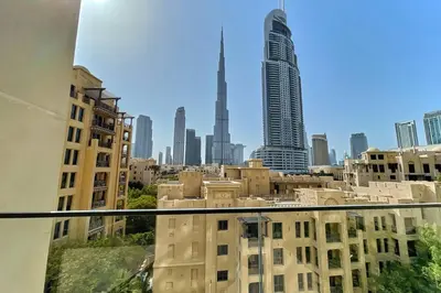 a view of a city skyline with tall buildings at FIRST CLASS 2BD, Full Burj Khalifa view in the Heart of Downtown in Dubai
