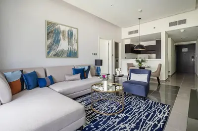 a living room with a couch and a table at Frank Porter - Majestine 1 in Dubai