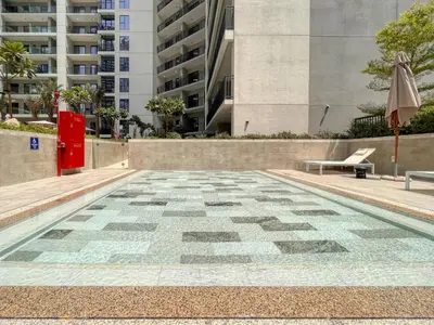 a patio with a table and an umbrella and a bench at Quasi-Hotels Zada Cozy Lux in Business Bay 1BR in Dubai