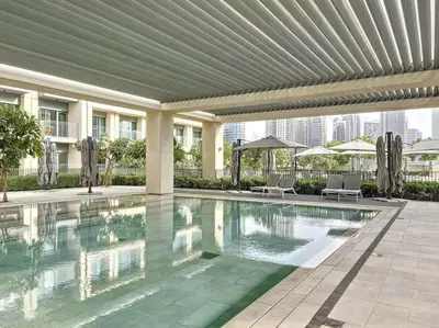 a swimming pool in the middle of a building at Burj Royale - Classic One Bedroom in Dubai