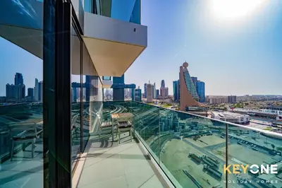 a view of the city from the top of a building at Pristine Cozy One Bedroom Suite in Dubai