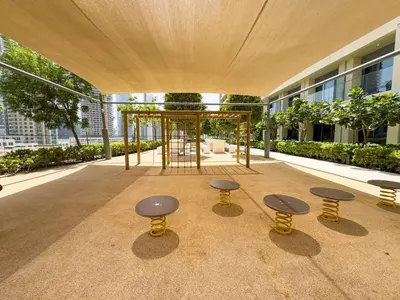 a group of stools in the middle of a building at Vogue Downtown Burj Royale near Dubai Mall and Burj Khalifa ,Two Bedroom Apartment with large Balcony and Access to all Amenities in Dubai