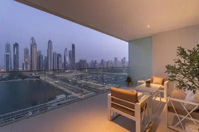 a room with a view of a city skyline at Sunrise Bay with treasure stunning harbour view by Suiteable in Dubai