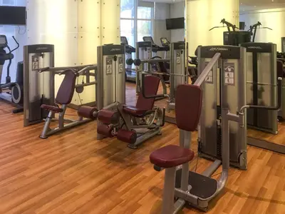 a gym with several treadmills and cardio machines at Luxury 2BR Panoramic Marina Views High Floor in Dubai