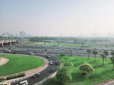 an aerial view of a highway with cars on it at Havana Holiday Homes Oud Metha in Dubai