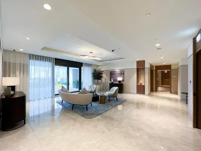 a large living room with a couch and chairs at HomesGetaway -Lavish 1BR in ACT One Downtown Dubai in Dubai