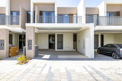 a car parked in front of a building at Exclusive Spacious Villa I Garden I Tilal Al Ghaf in Dubai