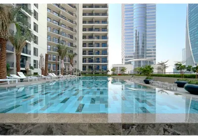 a swimming pool in the middle of a building at Keyrock Living - Lakeview Escape in Business Bay in Dubai