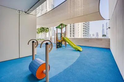 a play area with a slide and a playground at Emaar Beachfront - Beach Vista Tower, Dubai Marina in Dubai