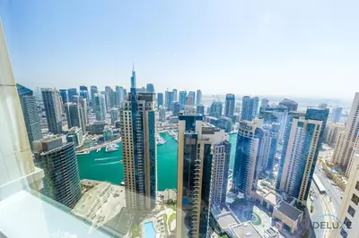 an aerial view of a city with tall buildings at Ain Dubai & Sea Views 2BR Close to Beach, Rimal 4, Jumeirah Beach Residence, by Deluxe Holiday Homes in Dubai