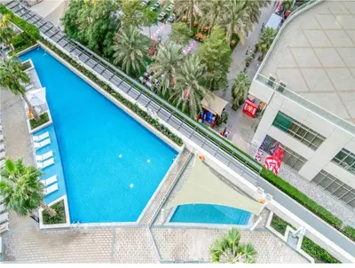 an overhead view of a swimming pool in a building at Address JBR Marina Views, Address Beach Resort Residence, Dubai Marina - Mint Stay in Dubai