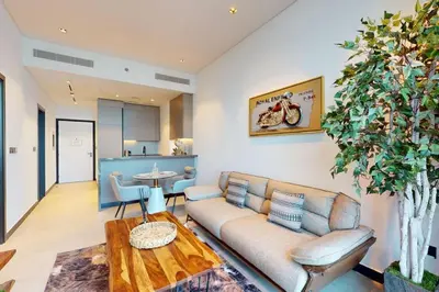 a living room with a couch and a table at 15 Northside Tower 2 - Spacious One Bedroom in Dubai
